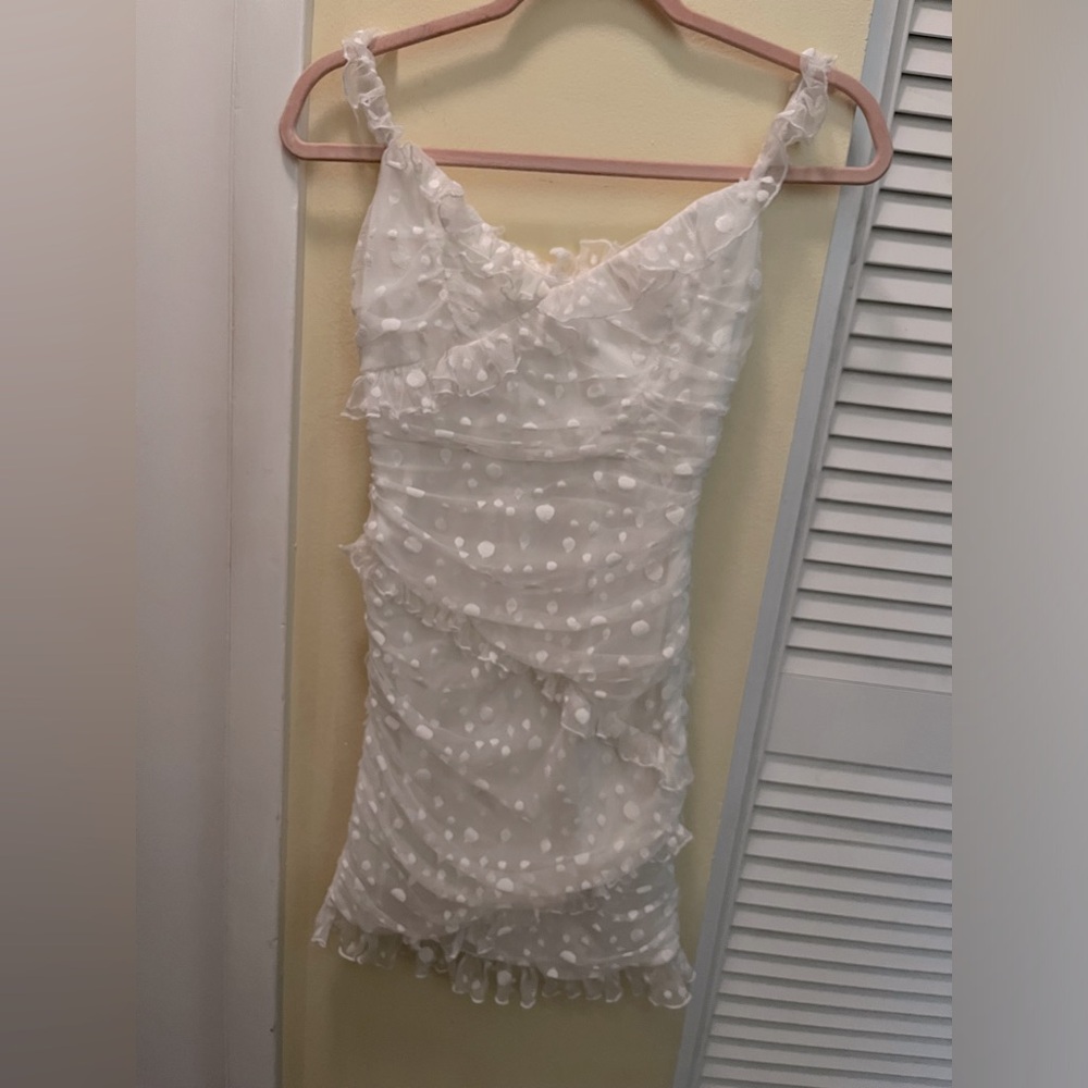 NWOT Selfie Leslie. Sz Med. white dress. With polka dots and zip on side. Lined